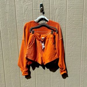 Aerie orange two piece lounge set with cropped sweatshirt and shorts. Size S